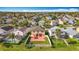 The home features a cozy backyard with a large patio, perfect for outdoor entertaining at 27500 Breakers Dr, Wesley Chapel, FL 33544