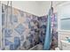 Bathroom featuring patterned tiles and a shower/tub combination at 3333 San Bernadino St, Clearwater, FL 33759