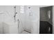 Modern bathroom with marble shower and niche at 9050 San Martin Ne Blvd, St Petersburg, FL 33702