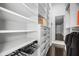 Custom closet with shelving, drawers, and mirrors at 9050 San Martin Ne Blvd, St Petersburg, FL 33702