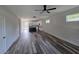 Spacious open-concept living area features modern floors and leads into the kitchen at 10019 N Hyaleah, Tampa, FL 33617