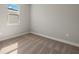 Cozy bedroom with carpet and a window letting in natural light at 12193 Meditation Trl, Venice, FL 34293