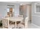 Cozy dining area with neutral colors and a view of the connected kitchen space at 6025 Shore S Blvd # 311, Gulfport, FL 33707
