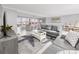 Spacious living room with water view, comfortable seating, and stylish decor at 6025 Shore S Blvd # 311, Gulfport, FL 33707