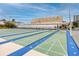 Outdoor shuffleboard courts with seating and the Town Shores Gulfport recreation center in the background at 6025 Shore S Blvd # 311, Gulfport, FL 33707