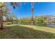 Scenic backyard view of the pond, perfect for relaxation and enjoying the natural surroundings at 6303 Green Oak Cir, Bradenton, FL 34203