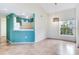 Bright dining area with neutral walls, ceramic floors, and a window at 6303 Green Oak Cir, Bradenton, FL 34203