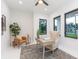 Bright home office with neutral furniture, natural light, and a modern design at 716 S Lois Ave, Tampa, FL 33609