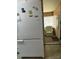 Kitchen with a white refrigerator at 12501 Ulmerton Rd # 140, Largo, FL 33774