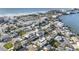Aerial view of a home with a roof top deck near the beach at 18077 3Rd St, Redington Shores, FL 33708