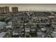 An aerial view of a neighborhood near the water and beach at 18077 3Rd St, Redington Shores, FL 33708