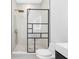 Modern bathroom featuring a glass enclosed shower with rain head and sleek toilet and vanity at 18077 3Rd St, Redington Shores, FL 33708