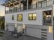 Striking home exterior with multiple balconies and garage doors at 18077 3Rd St, Redington Shores, FL 33708