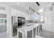 Modern kitchen featuring a large island and stainless steel appliances at 18077 3Rd St, Redington Shores, FL 33708