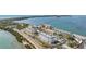 Scenic aerial view of a residential community featuring lush landscaping and serene waterfront views at 7 Elgin Pl # 603, Dunedin, FL 34698