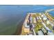 An aerial view of the condominium complex and the waterfront at 7 Elgin Pl # 603, Dunedin, FL 34698