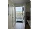 View from doorway to balcony overlooking the ocean and beach at 7 Elgin Pl # 603, Dunedin, FL 34698