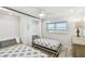 Twin bedroom with water view, built-in Murphy bed and drawers plus wood-look floors at 7 Elgin Pl # 603, Dunedin, FL 34698