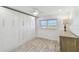 Well-lit bedroom with built-in storage and ocean view at 7 Elgin Pl # 603, Dunedin, FL 34698