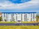 Well-maintained condominium building with covered entrance and parking at 7 Elgin Pl # 603, Dunedin, FL 34698