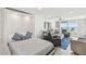 Cozy living space with murphy bed, leather seating, and ocean view at 7 Elgin Pl # 603, Dunedin, FL 34698