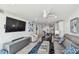 Bright and spacious living room with kitchen views at 7 Elgin Pl # 603, Dunedin, FL 34698