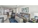Comfortable living area with kitchen access and open layout at 7 Elgin Pl # 603, Dunedin, FL 34698