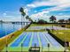 Community shuffleboard courts next to tennis courts and waterfront views enhance the property's appeal at 7 Elgin Pl # 603, Dunedin, FL 34698