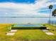 Shuffleboard court overlooking the bay, showcasing the community's waterfront recreational amenities at 7 Elgin Pl # 603, Dunedin, FL 34698