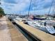 Marina view featuring docked boats, showcasing the community's waterfront access and recreational opportunities at 2402 Cumberland Cliff Dr, Ruskin, FL 33570