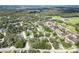 Overhead view of a residential area with lush trees and community at 8902 Temple Park Dr, Tampa, FL 33637