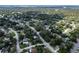 A high-angle shot illustrates a quiet residential area, highlighting the neighborhood's peaceful environment and design at 8902 Temple Park Dr, Tampa, FL 33637