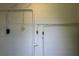Image of a basement utility area with white-painted walls and exposed pipes and an electrical outlet at 8902 Temple Park Dr, Tampa, FL 33637