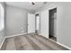 Carpeted bedroom with standard closet and doors, offering a blank canvas with neutral color palette at 8902 Temple Park Dr, Tampa, FL 33637