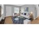 Bright, furnished living room offers a relaxing and stylish space at 8902 Temple Park Dr, Tampa, FL 33637