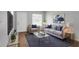 Charming living room with modern decor and comfortable seating, perfect for relaxation at 8902 Temple Park Dr, Tampa, FL 33637
