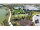 Aerial view of the community amenities including a pool, park, and clubhouse at 4639 Garofalo Rd, Wesley Chapel, FL 33543