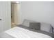 Cozy bedroom features neutral tones, plush bedding, and ample natural light at 6033 34Th W St # 45, Bradenton, FL 34210