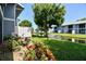 Exterior view of a community with waterway and mature landscaping at 6033 34Th W St # 45, Bradenton, FL 34210