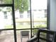Screened patio offering serene views of the pond at 6033 34Th W St # 45, Bradenton, FL 34210