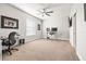 Bright office featuring a window, a ceiling fan, and a modern computer setup at 10920 Flint Estates Dr, Thonotosassa, FL 33592