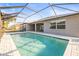 Inviting screened-in pool with a spacious patio, perfect for outdoor relaxation and entertaining at 10920 Flint Estates Dr, Thonotosassa, FL 33592