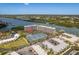Waterfront condo with tennis courts, beautiful river views, and lush landscaping create a resort-like atmosphere at 19451 Gulf Blvd # 204, Indian Shores, FL 33785
