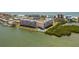Breathtaking aerial view of waterfront property highlighting the coastal beauty at 19451 Gulf Blvd # 204, Indian Shores, FL 33785
