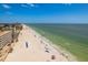 Breathtaking aerial view of a pristine beachfront condo complex offering an idyllic coastal lifestyle at 19451 Gulf Blvd # 204, Indian Shores, FL 33785