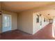 Exterior condo hallway with unit entry and fire safety equipment with durable flooring at 19451 Gulf Blvd # 204, Indian Shores, FL 33785