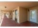 Well-lit condo hallway providing easy access to units via elevator and secure entrances at 19451 Gulf Blvd # 204, Indian Shores, FL 33785