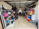A spacious garage with ample storage and various tools and equipment at 27064 Omni Ln, Punta Gorda, FL 33983