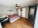 Serene bedroom with a large bed, neutral walls, and ample closet space at 27064 Omni Ln, Punta Gorda, FL 33983