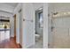 Bathroom area displays glass shower with detailed tilework and toilet area at 9413 Swift Creek Cir, Dover, FL 33527